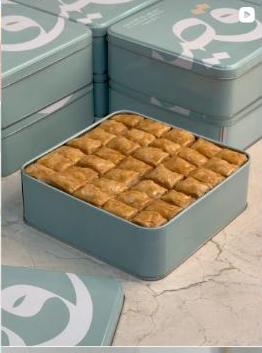 A full tin box of golden baklava